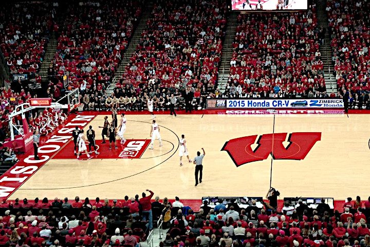 Wide image showing the University of Wisconsin basketball court and fieldhouse used to highlight floors on the decision maker page.